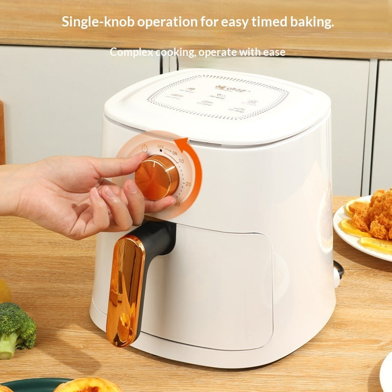 White air fryer oven with single dial knob and gold handle, ready for cooking