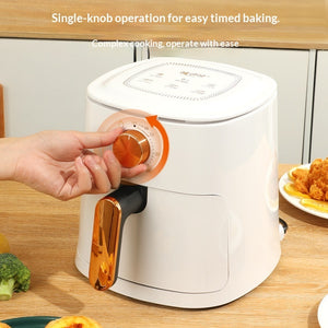 White air fryer oven with single dial knob and gold handle, ready for cooking