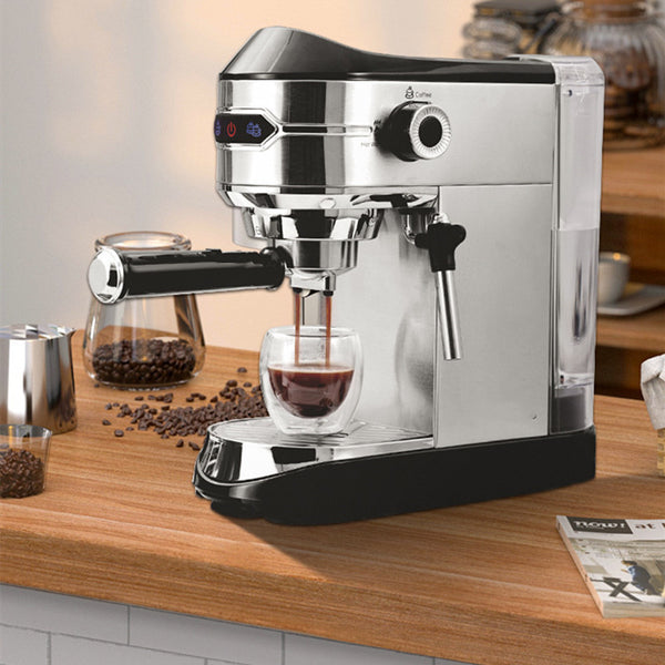 Silver semi-automatic steam wand milk frother with cup under dispensing spout